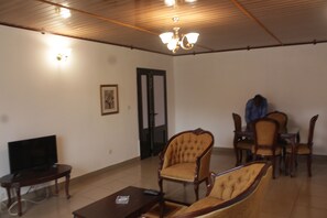 Classic Apartment, 1 Bedroom | Living area | Flat-screen TV