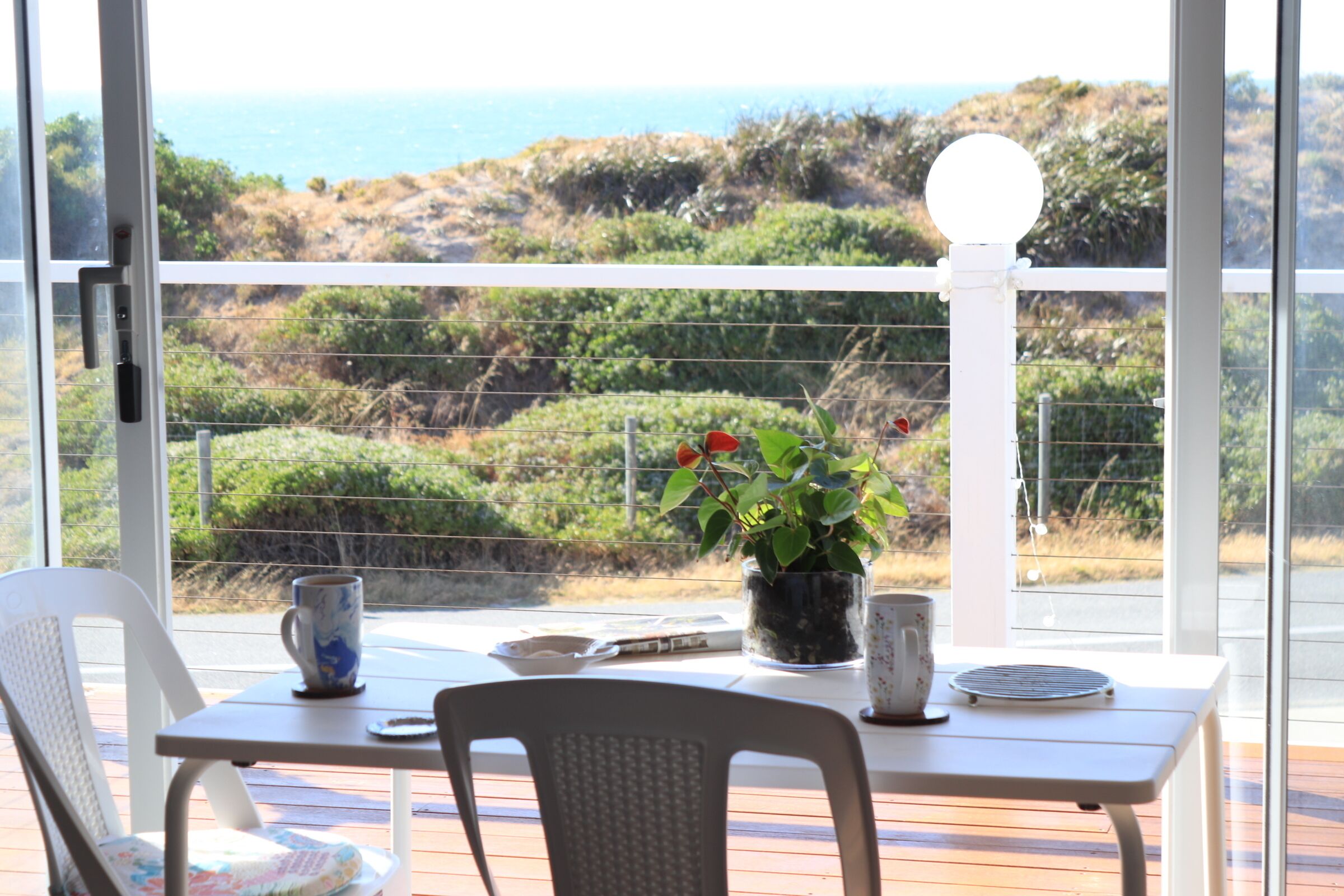 Ocean Blue Halls Head beach front — image 7