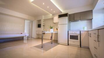 Apartemen Superior | Dapur pribadi | Lemari es, kompor, ketel listrik, dan pemanggang roti