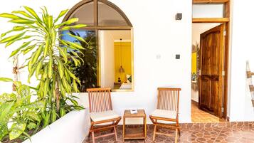 Quarto casal, vista para o jardim | Terraço/pátio