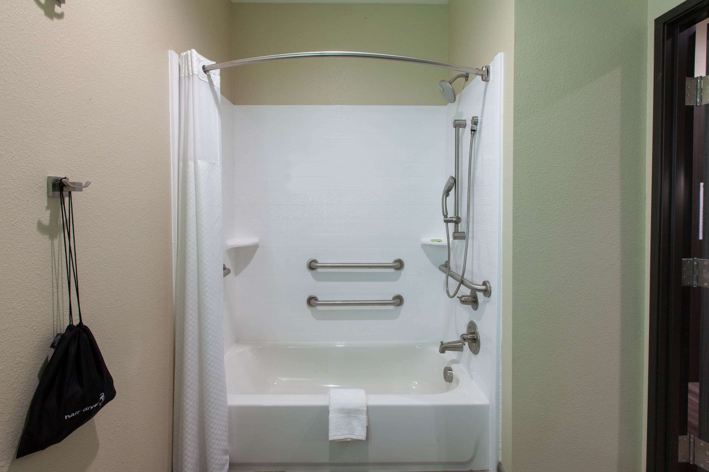 hair dryer, towels, soap, shampoo