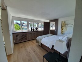 Apartamento urbano | Frigobar, escrivaninha, espaço de trabalho para notebook