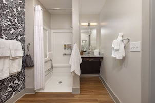 Combined shower/tub, hair dryer, towels, soap