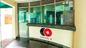 A reception area with a sign indicating 'RECEPTION' and a list of hotel names and prices. - Hotel Verona (Tlalnepantla de Baz)