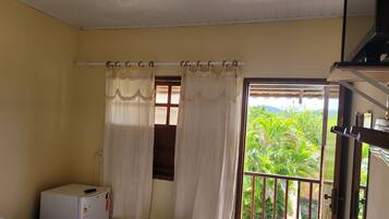 Quarto casal | Frigobar, cortinas blackout, Wi-Fi de cortesia, roupa de cama