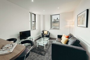 The Eureka! Family Apartment 216 | Living area | Flat-screen TV, Netflix