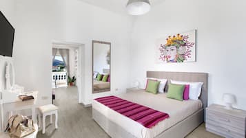 Tabla de planchar con plancha, wifi gratis y ropa de cama