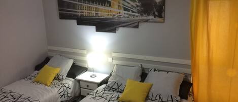 2 habitaciones, tabla de planchar con plancha y wifi gratis