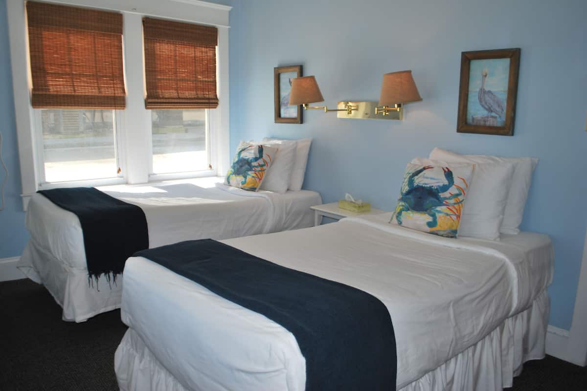 ocean front 2 bedroom, 1 double 2 twin | blackout curtains, bed sheets
