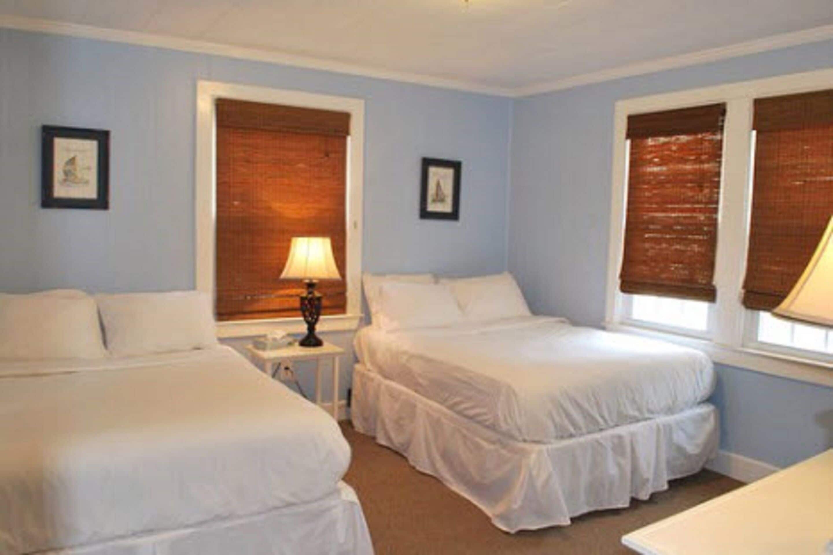 lodge building, 2 double beds, non-ocean front | blackout curtains, bed sheets