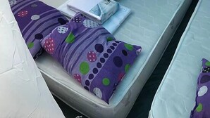 A tent with a mattress, pillows, and a blanket. - Bodrum Masali Camping - Hostel (Bodrum)