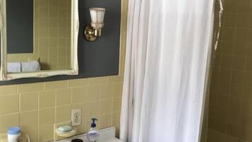 Combined shower/tub, hair dryer, towels, soap
