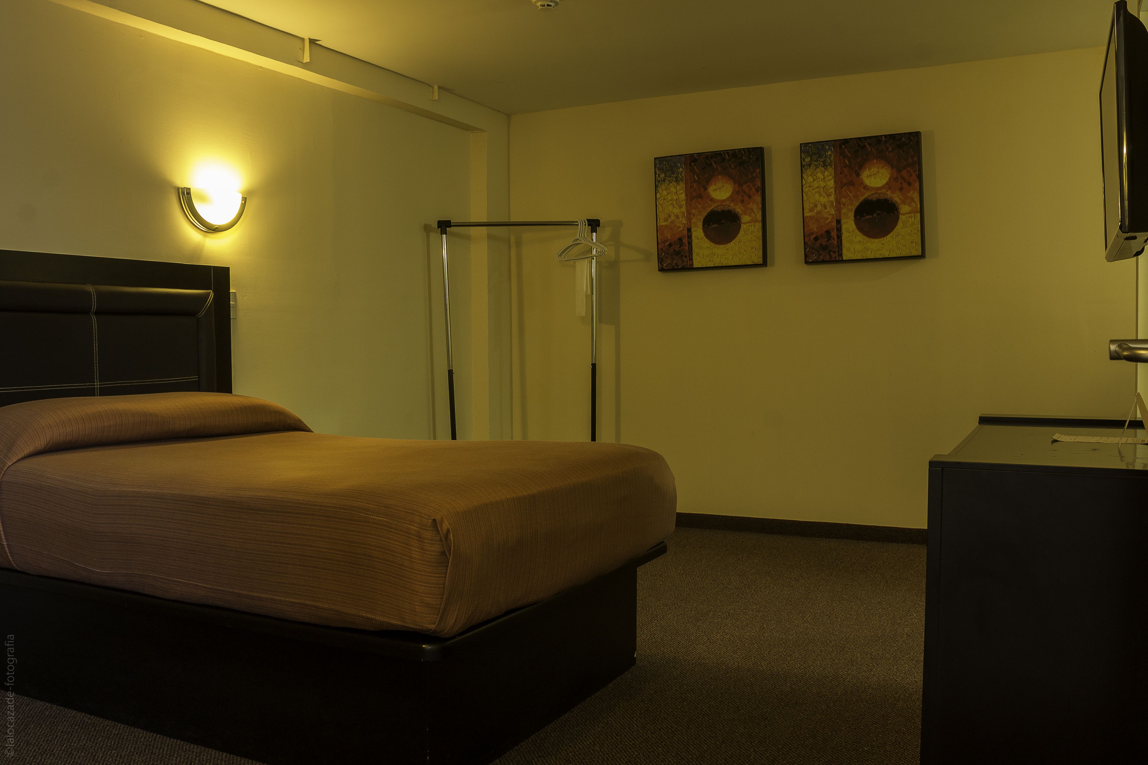 comfort room, 1 double bed | desk, laptop workspace, blackout curtains, iron/ironing board