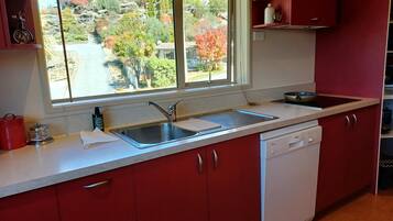 Coffee/tea maker, fridge, microwave, oven