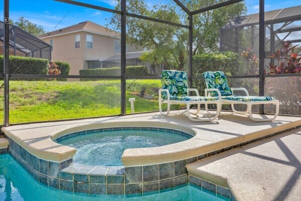A heated pool, pool loungers