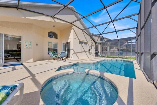 A heated pool, pool loungers