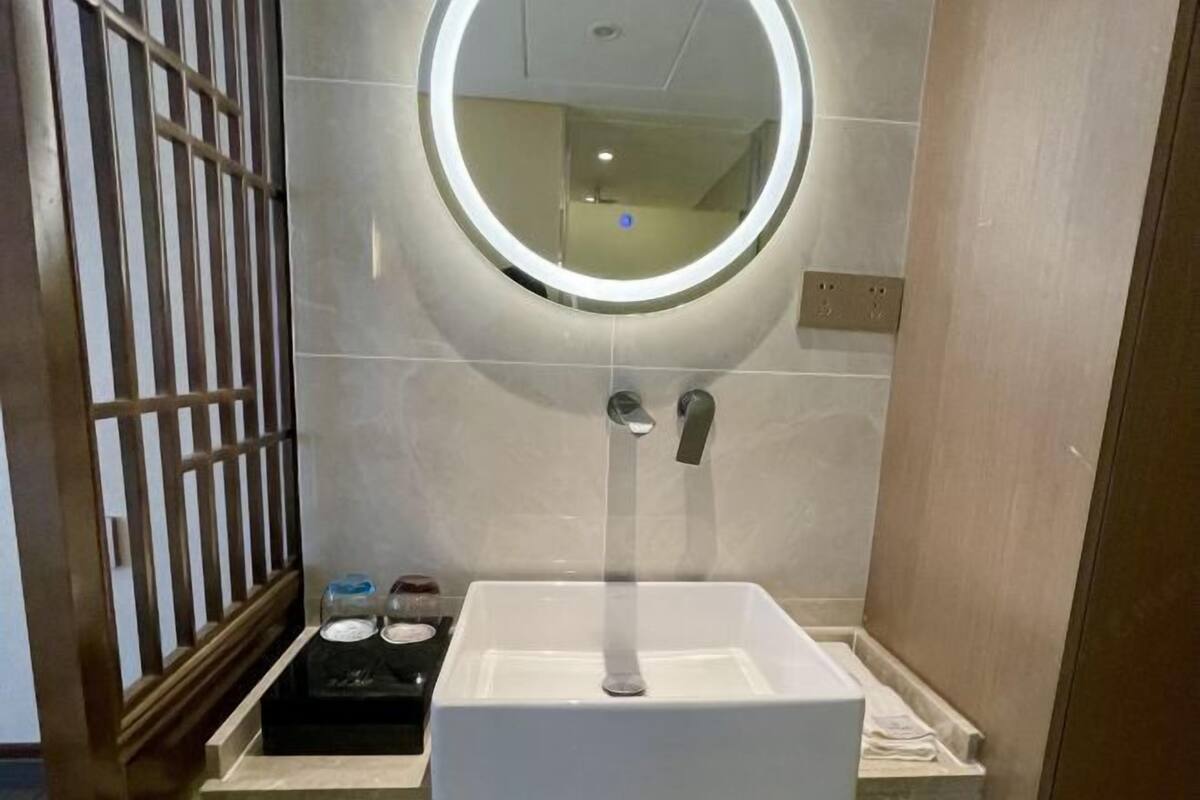 Bathroom | Shower, free toiletries, hair dryer, slippers