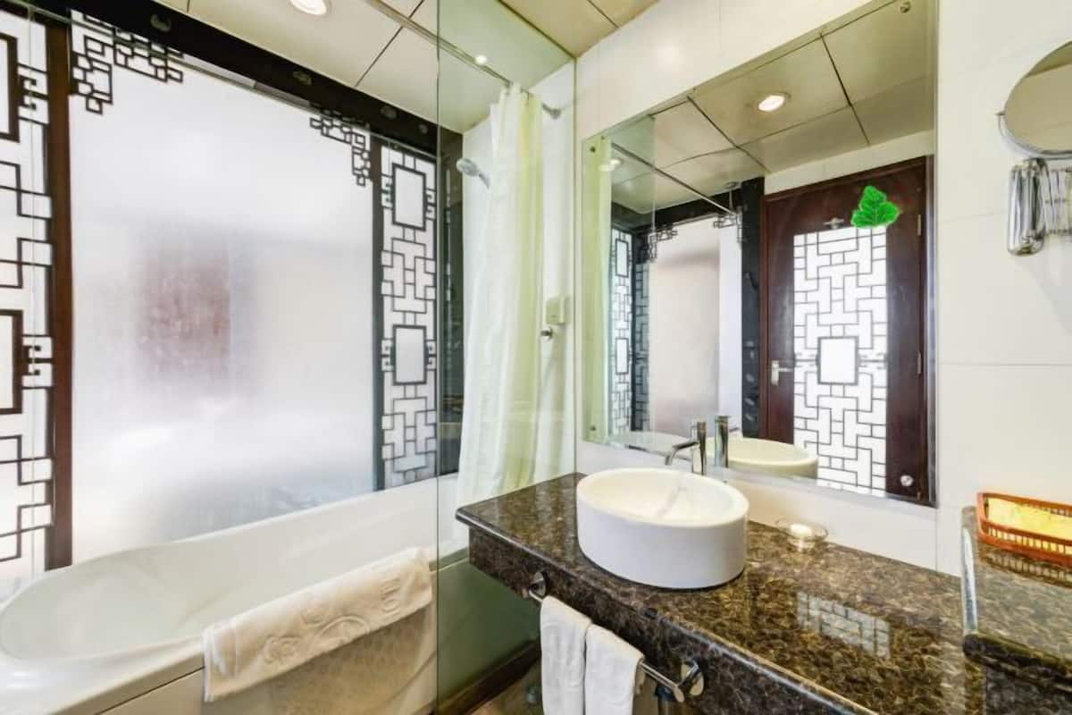 Bathroom | Shower, free toiletries, hair dryer, slippers