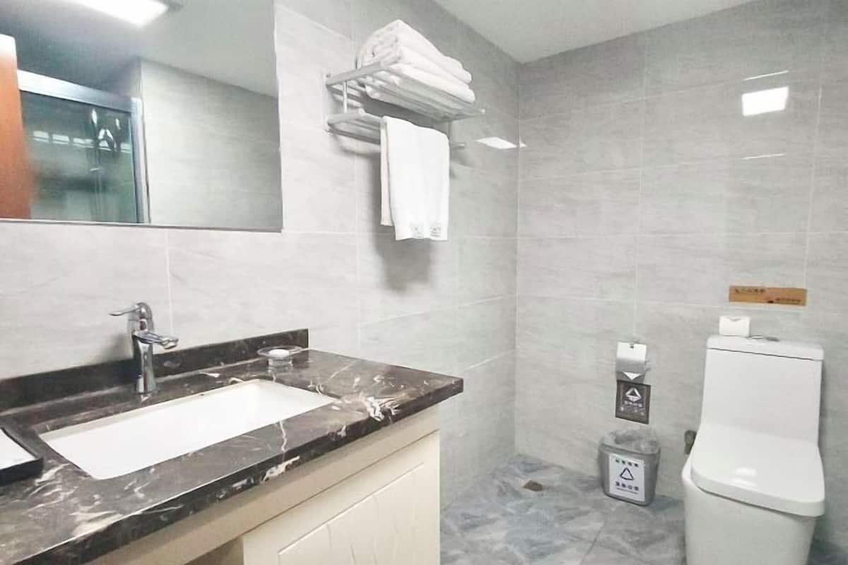 Bathroom | Shower, free toiletries, hair dryer, slippers