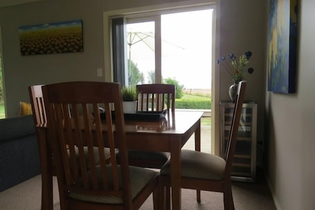 Dining. This beautiful cottage welcomes you with unique br