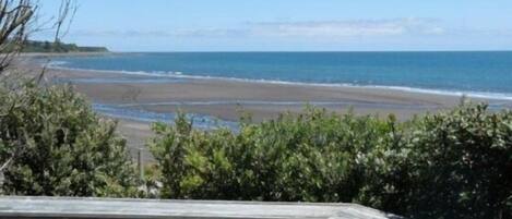 On the beach, sun-loungers