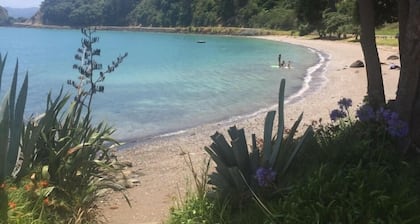 Te Kouma, Coromandel. Steps away from safe swimming beach and fishing access.