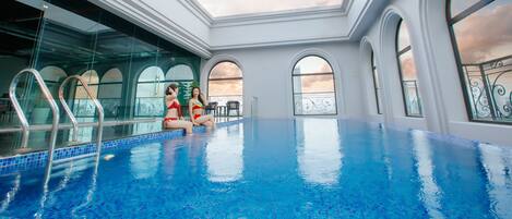 Outdoor pool, open 6:00 AM to 6:00 PM, pool umbrellas, sun loungers