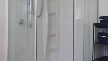 Hair dryer, towels, soap, shampoo