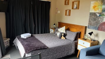 Fer et planche à repasser, Wi-Fi gratuit, draps fournis