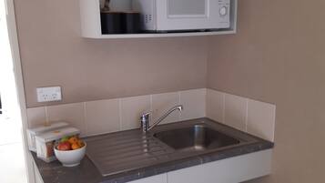 Fridge, microwave, stovetop, electric kettle