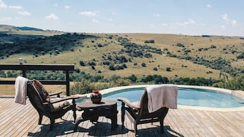 Outdoor pool, pool umbrellas, pool loungers