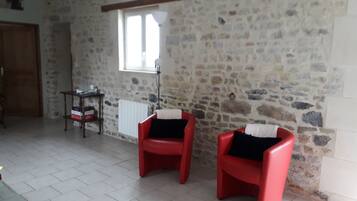 Suite | Coin séjour | Télévision à écran plat, lecteur de DVD