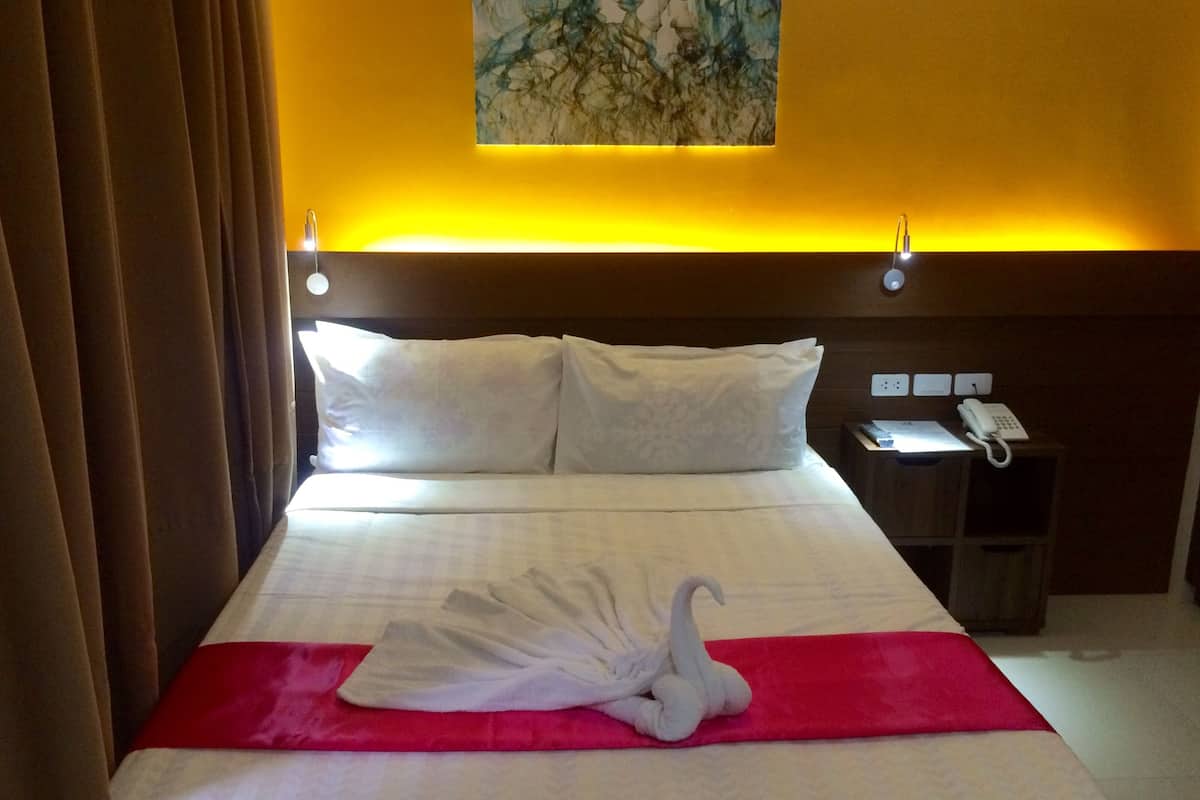 vip room 1 | desk, laptop workspace, iron/ironing board, rollaway beds