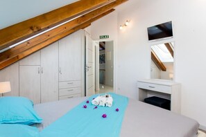 2 habitaciones, tabla de planchar con plancha, internet y ropa de cama 