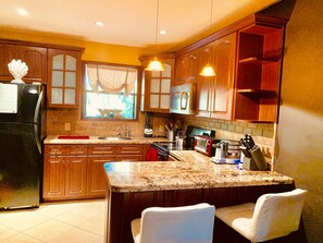Fridge, microwave, coffee/tea maker, toaster