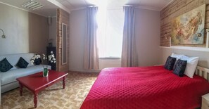 Quarto casal luxo | Cortinas blackout, ferros/tábuas de passar roupa, Wi-Fi de cortesia