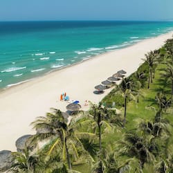 Private beach, white sand, sun loungers, beach umbrellas
