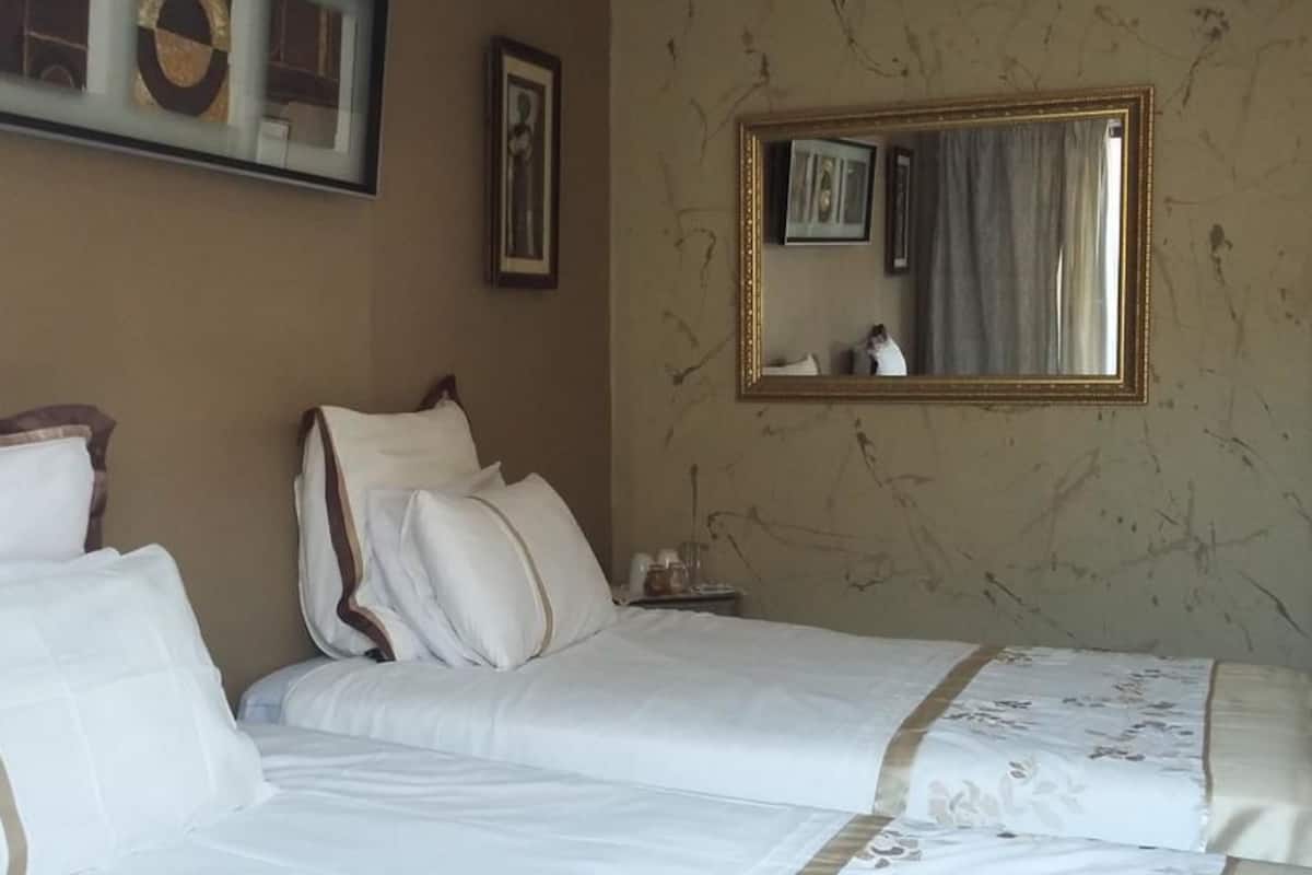 Habitación triple | Cunas gratuitas y ropa de cama