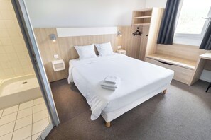 Desk, blackout curtains, soundproofing, free WiFi