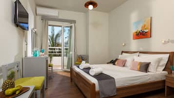 Double or Twin Room | Minibar, iron/ironing board, free WiFi, bed sheets