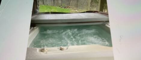 Combined shower/tub, hair dryer, towels, soap