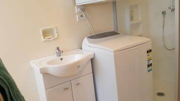Hair dryer, towels, soap, shampoo