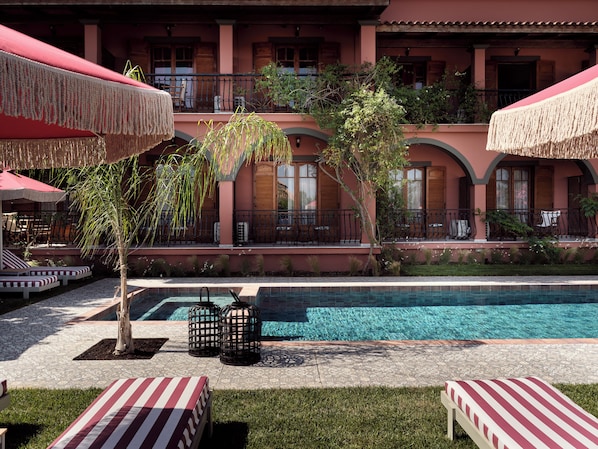 Outdoor pool, pool umbrellas, pool loungers