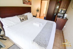 Down duvets, minibar, blackout curtains, iron/ironing board