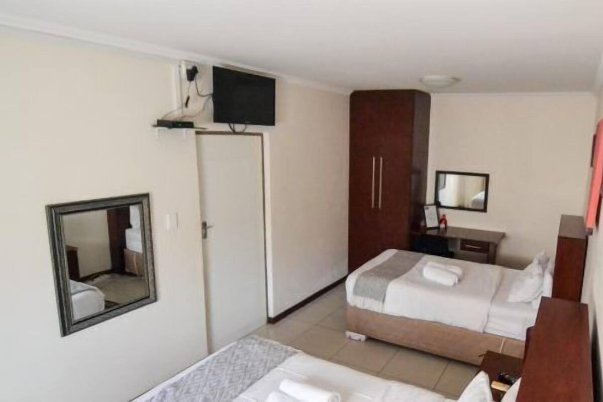 Down duvets, minibar, blackout curtains, iron/ironing board