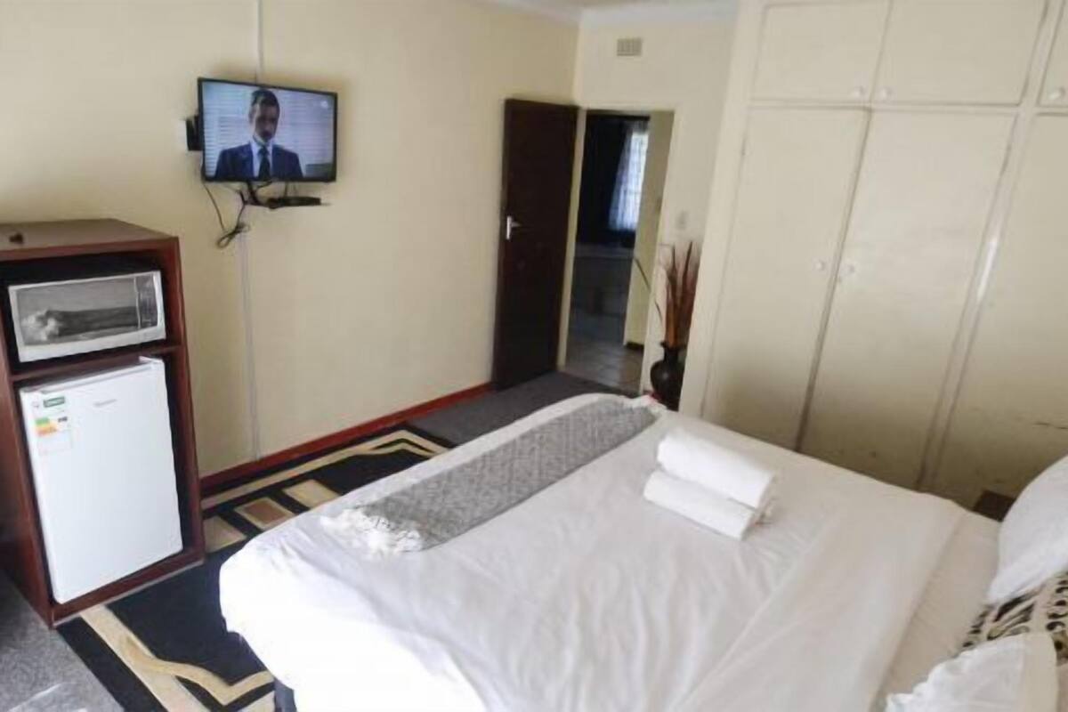 Down duvets, minibar, blackout curtains, iron/ironing board