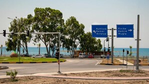A road intersection with directional signs for Kumluca, Kemmer, Antalya, Finike, Demre, and Mugla. - Baykal Pansiyon (Finike)