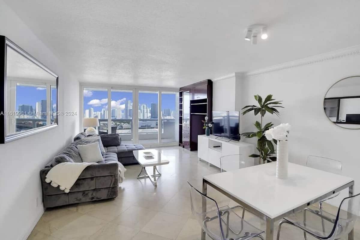 Apartment (1 Bedroom) | Living area | 55-inch TV with digital channels, Netflix, streaming services