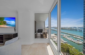 Deluxe Apartment, 3 Bedrooms | Living area | 55-inch TV with digital channels, Netflix, streaming services