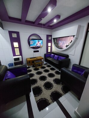 Deluxe Apartment, 1 Bedroom | Living area - Sagwe Furnished Apartments (Nairobi)